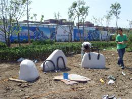 hj1736 石雕—箱包_青島國際服裝城不銹鋼雕塑、石雕、玻璃鋼雕塑_濱州宏景雕塑有限公司